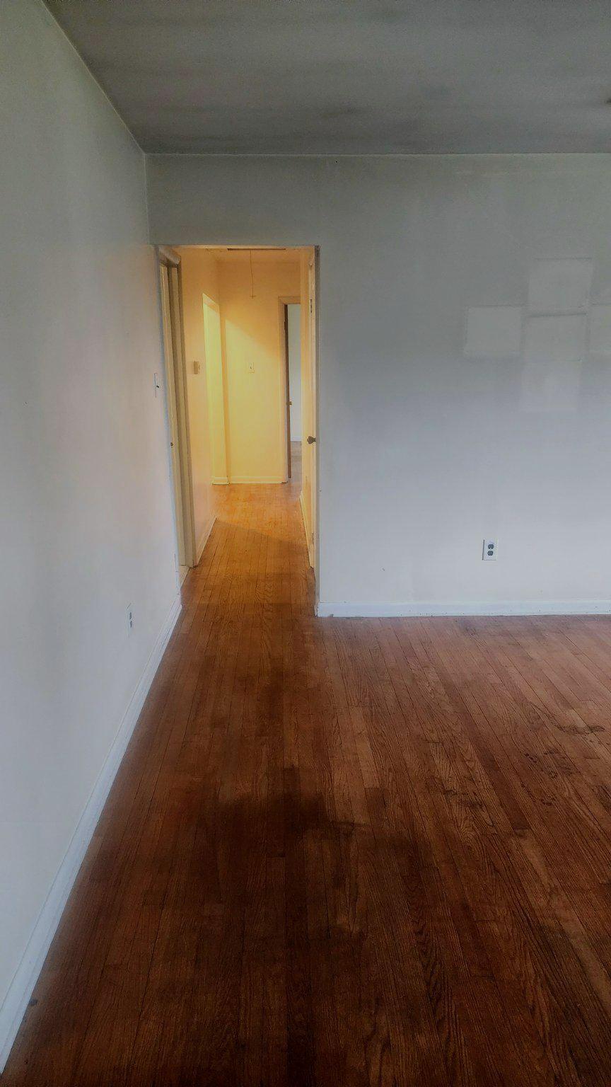 7612 Moores Road Brandywine, MD 20613 - Photo 2 of 15 Spacious Hallway with hard wood floors.