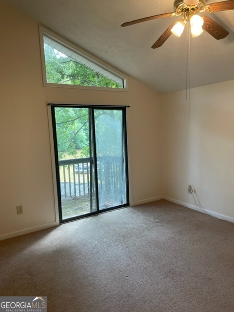 132 Collins Road Jackson, GA 30233 - Photo 12 of 39 a view of an empty room with a window