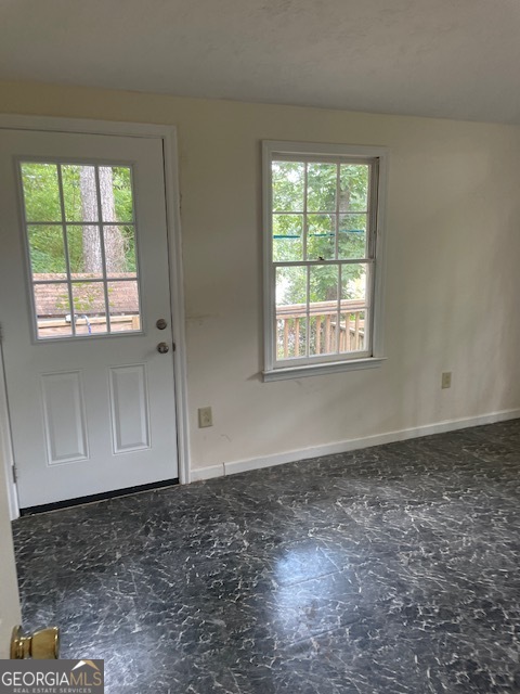 132 Collins Road Jackson, GA 30233 - Photo 16 of 39 an empty room with windows