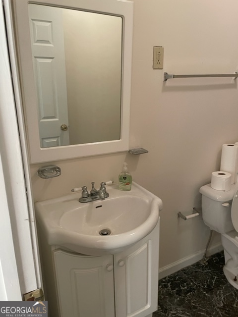 132 Collins Road Jackson, GA 30233 - Photo 18 of 39 a bathroom with a sink and a toilet