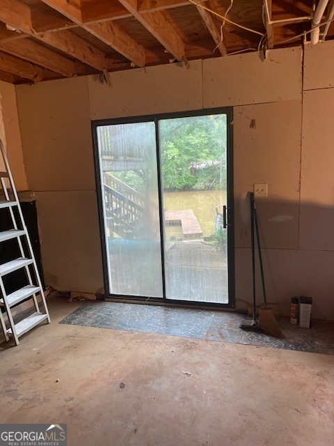 132 Collins Road Jackson, GA 30233 - Photo 27 of 39 a view of an empty room with windows
