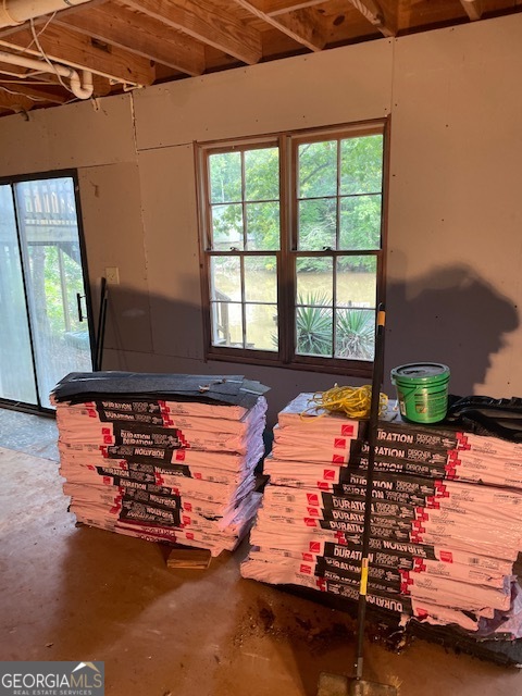 132 Collins Road Jackson, GA 30233 - Photo 28 of 39 a room with gym equipment and a large window