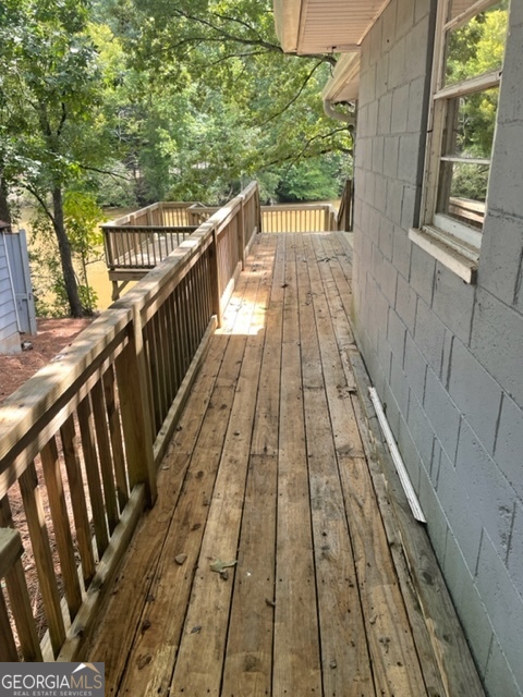 132 Collins Road Jackson, GA 30233 - Photo 29 of 39 a view of balcony with wooden floor