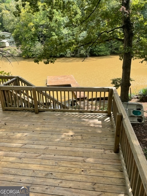 132 Collins Road Jackson, GA 30233 - Photo 31 of 39 a view of balcony with wooden floor and fence