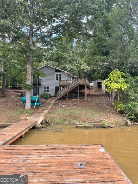 132 Collins Road Jackson, GA 30233 - Photo 37 of 39 a view of a house with pool and sitting area