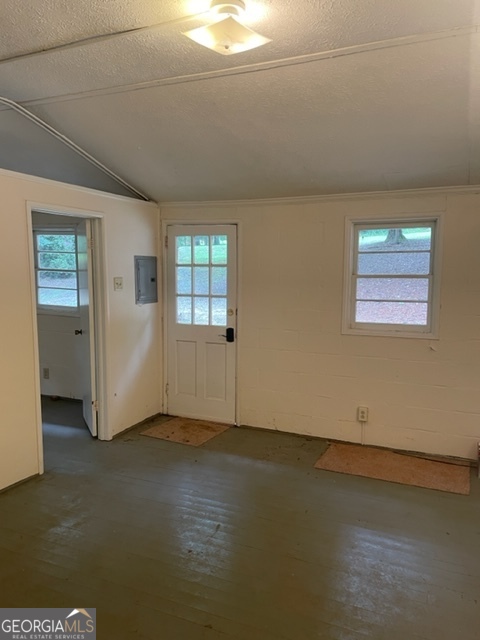 132 Collins Road Jackson, GA 30233 - Photo 9 of 39 an empty room with wooden floor and windows
