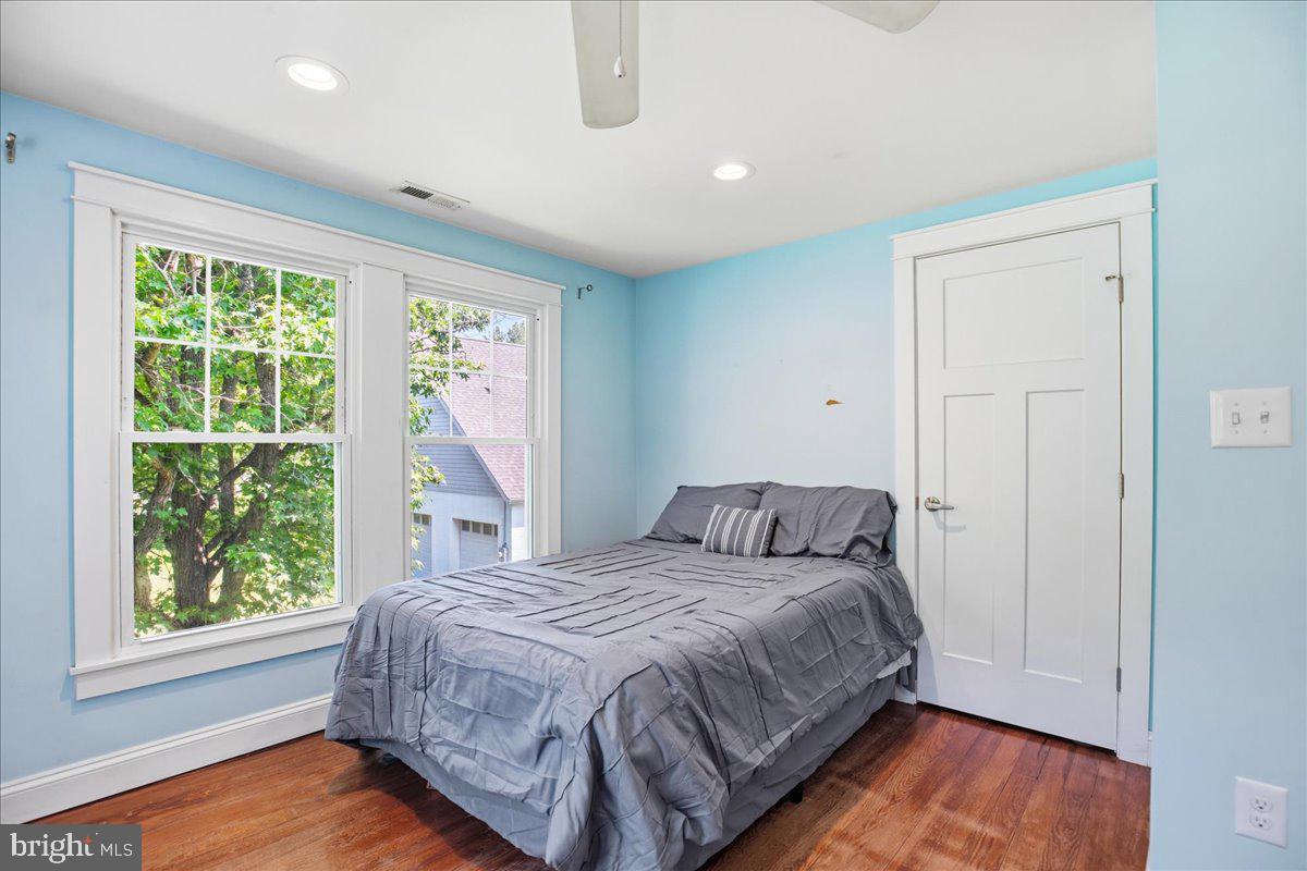 16146 Thomas Road Piney Point, MD 20674 - Photo 46 of 70 a bedroom with a bed and a window