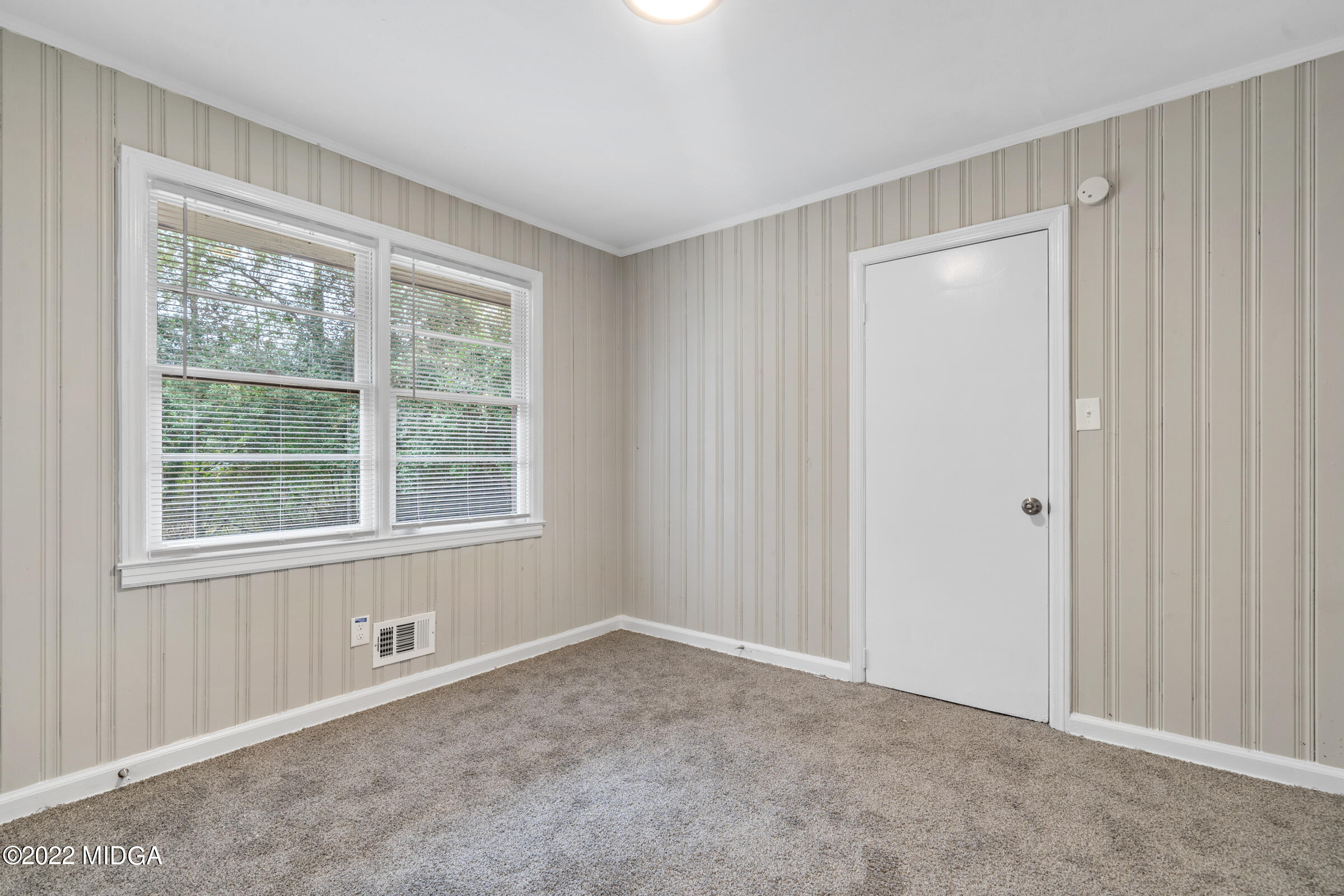 2225 Millerfield Road Macon, GA 31217 - Photo 13 of 21 a view of an empty room with a window