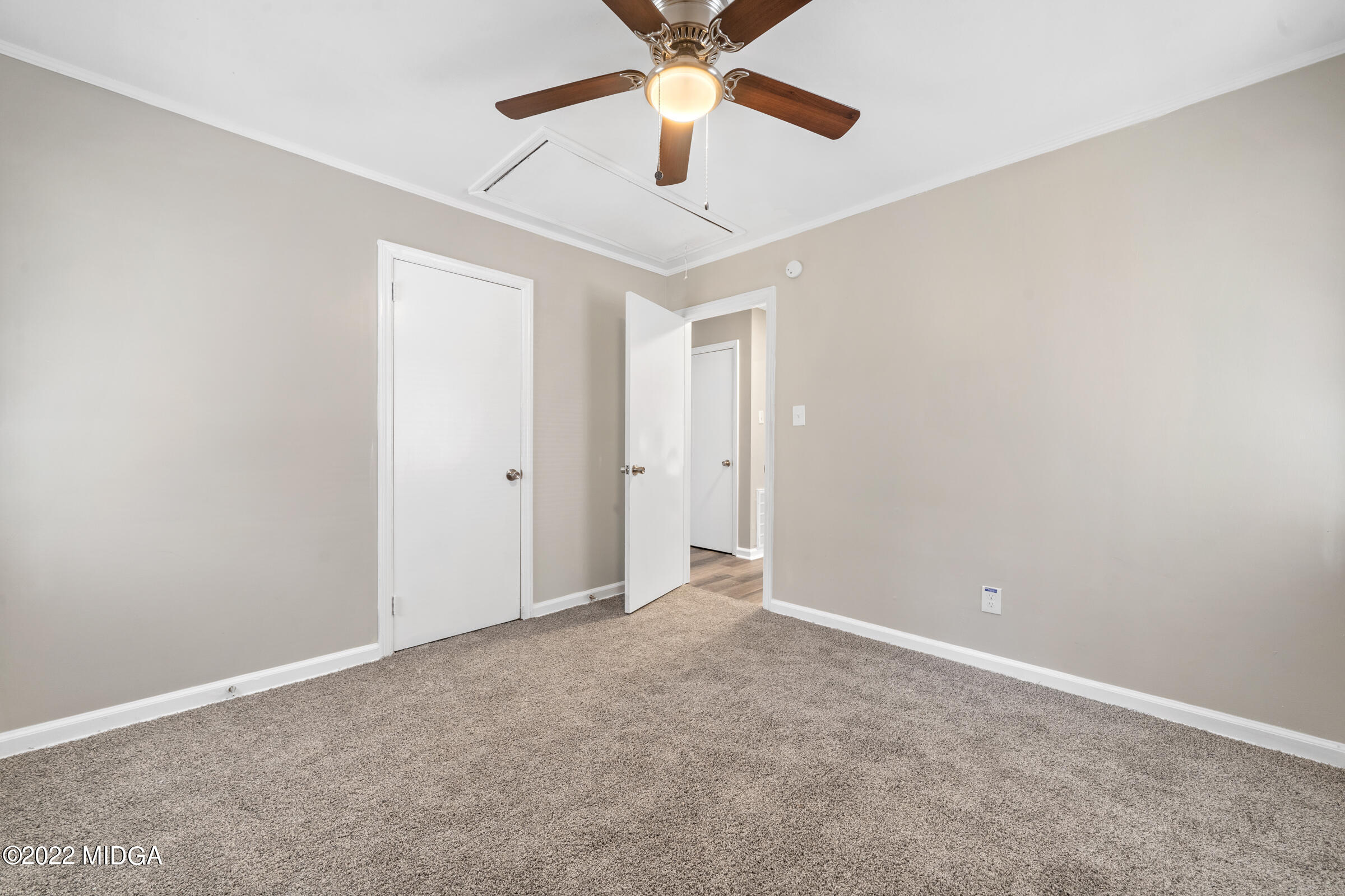 2225 Millerfield Road Macon, GA 31217 - Photo 19 of 21 an empty room with chandelier fan