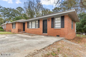 2225 Millerfield Road Macon, GA 31217 - Photo 2 of 21 a front view of a house with a garden