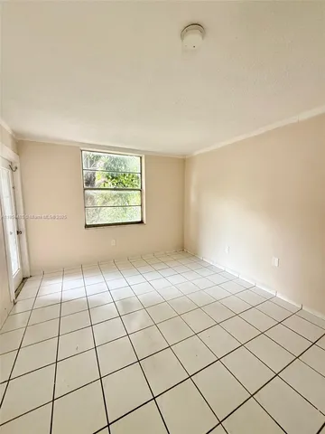 a view of a room and window