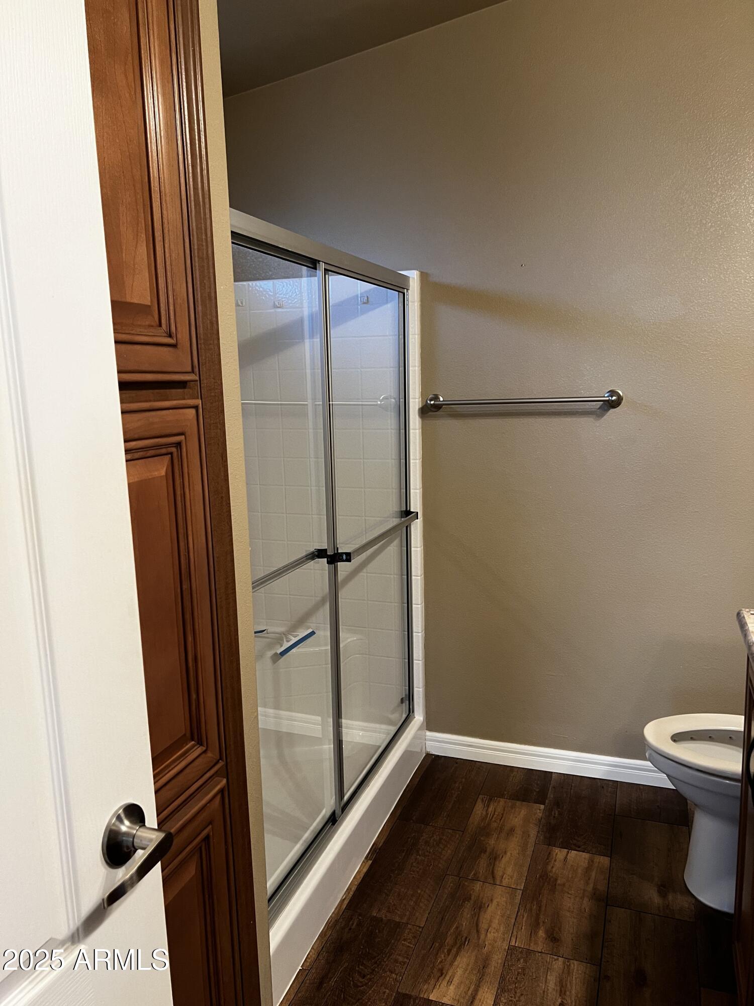 8865 East Baseline Road, Unit 555 Mesa, AZ 85209 - Photo 11 of 21 a bathroom with a toilet and a shower