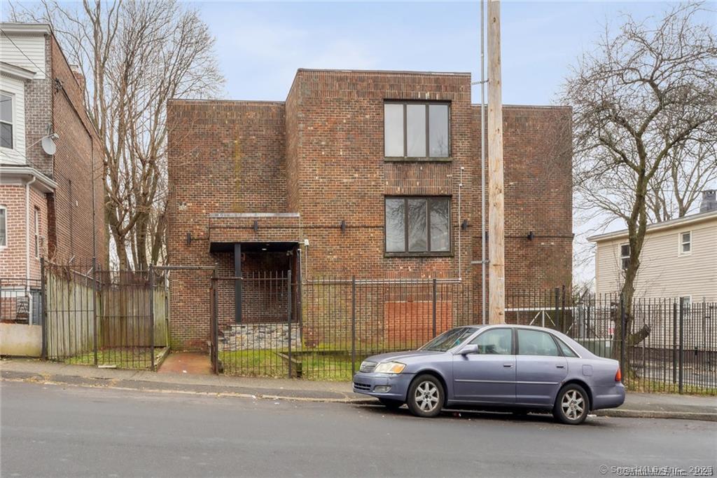 a car parked in front of a building