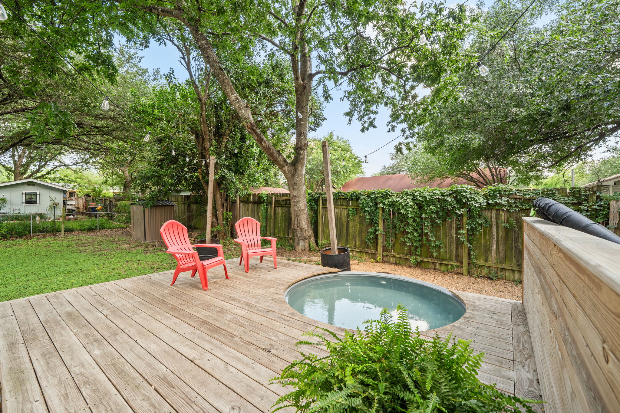 705 Dulwich Street Austin, TX 78748 - Photo 28 of 36 A spacious wood deck and private soaking pool offer a serene backyard retreat.