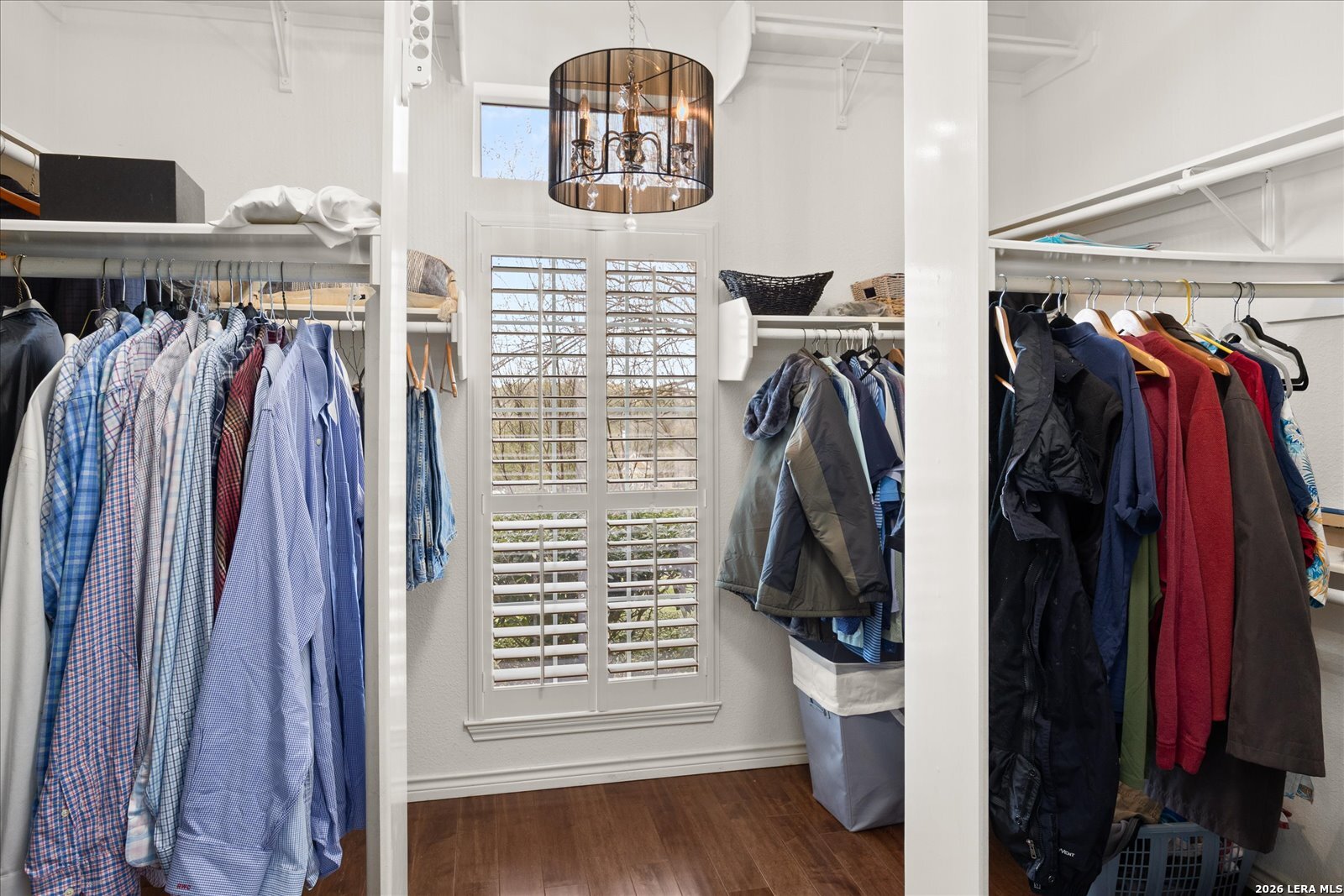 8718 Timberland Trail Fair Oaks Ranch, TX 78015 - Photo 27 of 50 a view of walk in closet with clothes and shoes