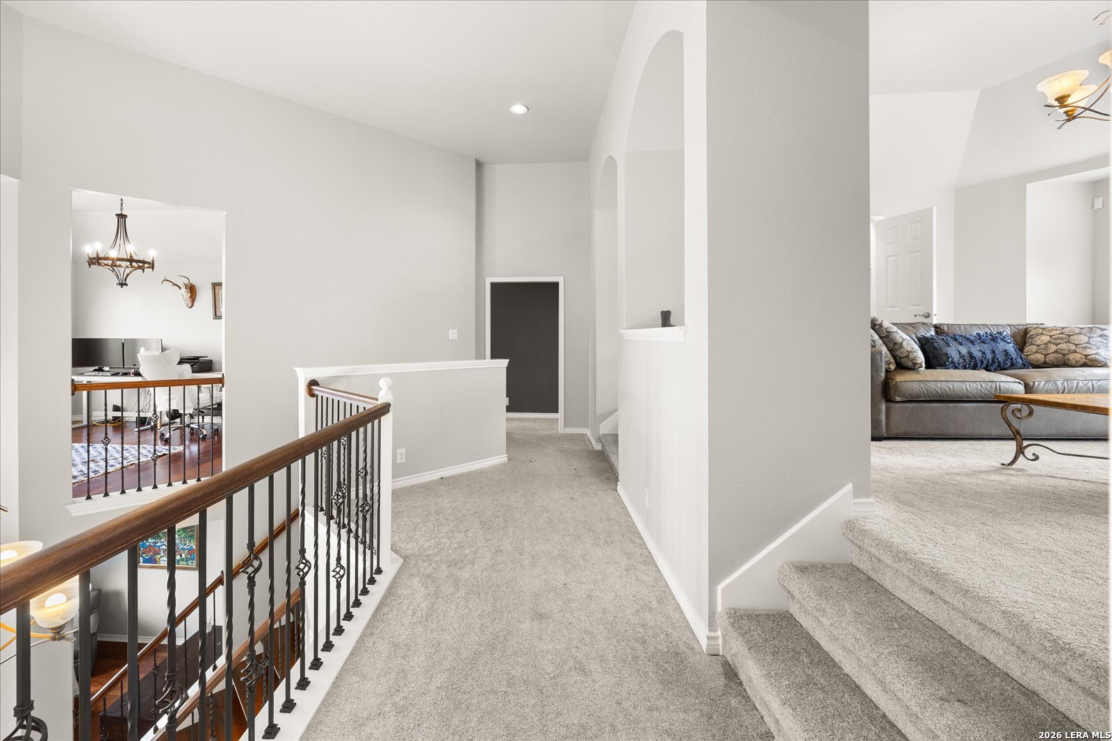 8718 Timberland Trail Fair Oaks Ranch, TX 78015 - Photo 29 of 50 a view of a hallway with seating area