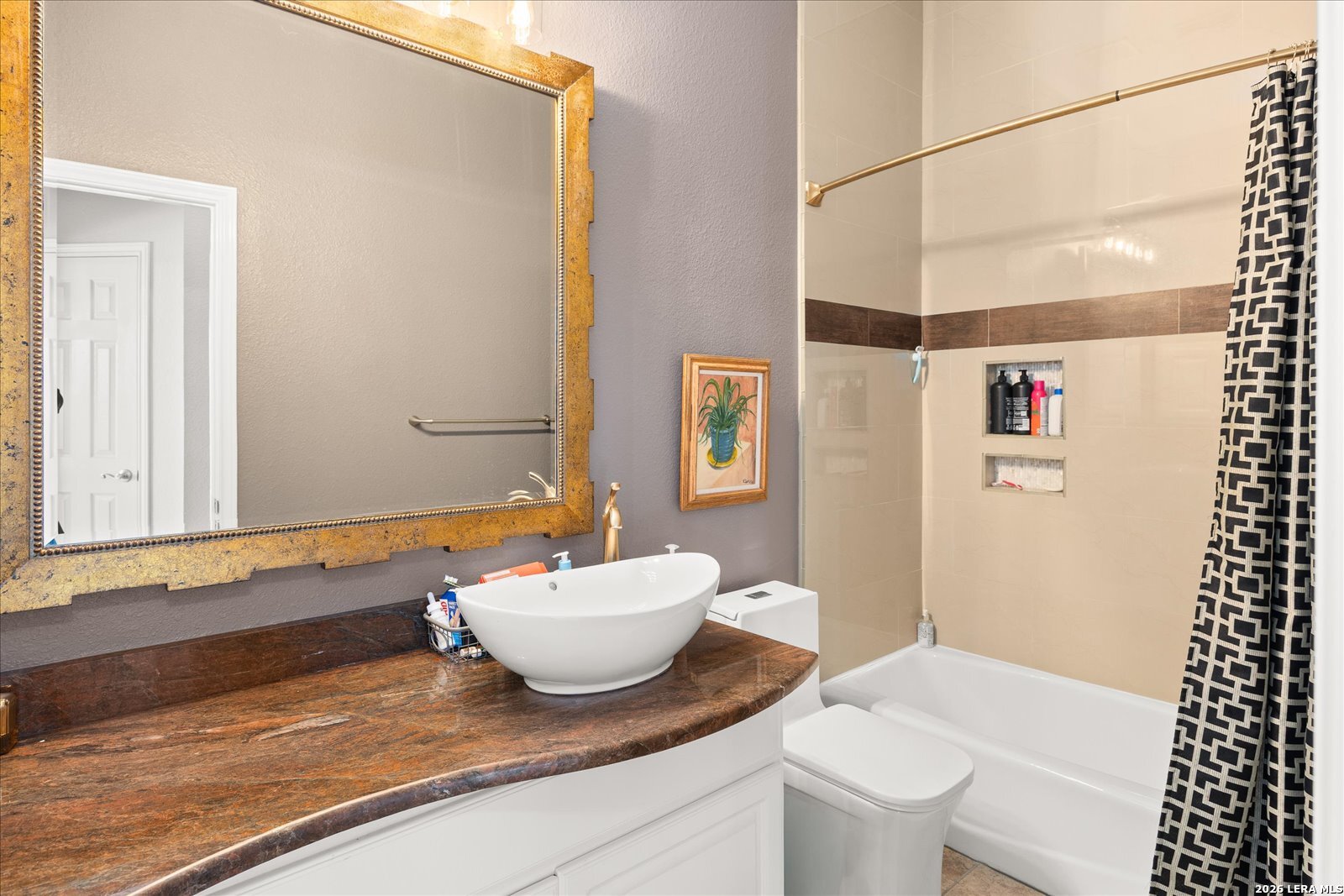 8718 Timberland Trail Fair Oaks Ranch, TX 78015 - Photo 34 of 50 a bathroom with a granite countertop sink mirror vanity and toilet