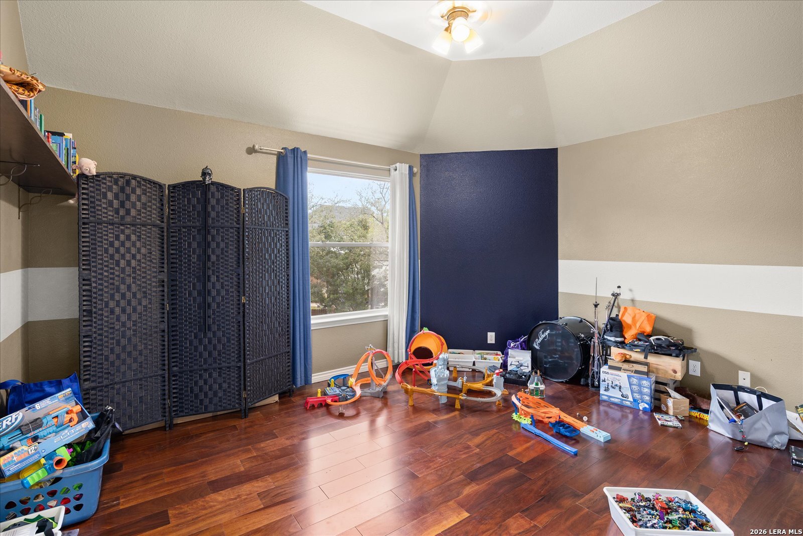 8718 Timberland Trail Fair Oaks Ranch, TX 78015 - Photo 38 of 50 a living room with furniture and a wooden floor