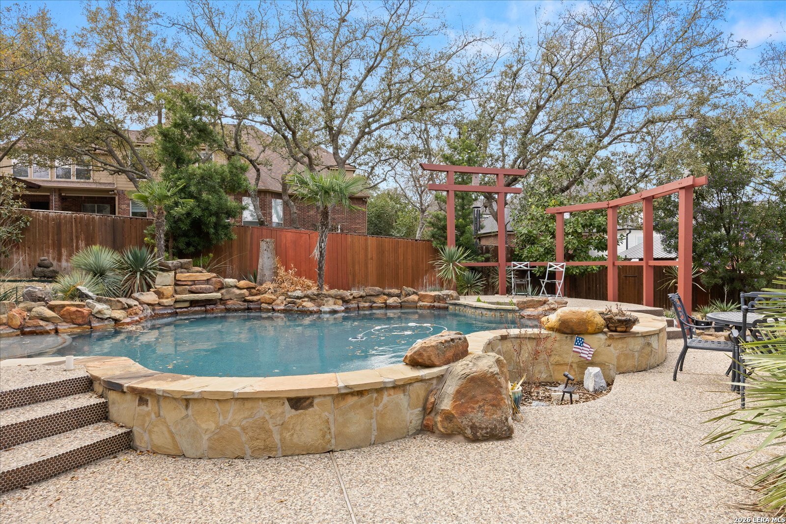 8718 Timberland Trail Fair Oaks Ranch, TX 78015 - Photo 42 of 50 a view of swimming pool with outdoor seating and plants