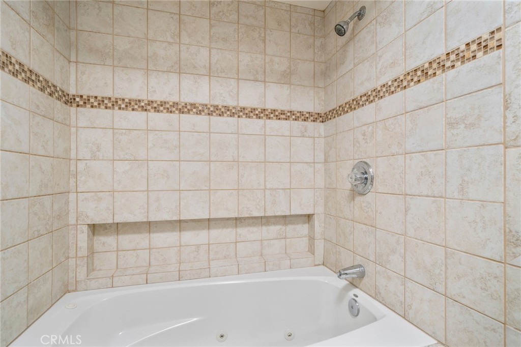 760 West Aster Street Upland, CA 91786 - Photo 16 of 40 a bathroom with a bathtub
