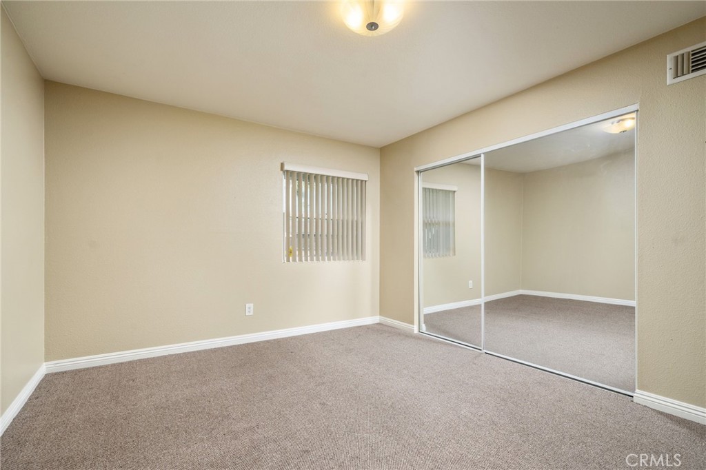 760 West Aster Street Upland, CA 91786 - Photo 17 of 40 an empty room with windows and closet