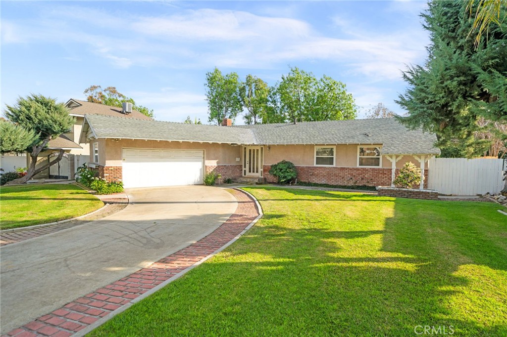 760 West Aster Street Upland, CA 91786 - Photo 27 of 40 a view of a house with a swimming pool