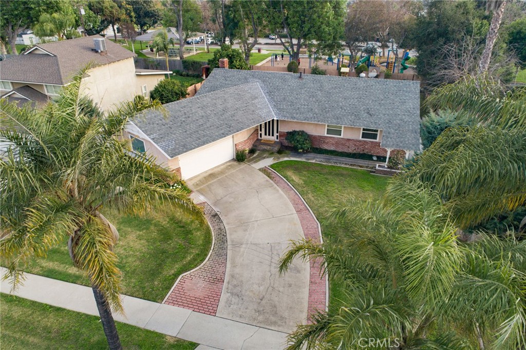 760 West Aster Street Upland, CA 91786 - Photo 30 of 40 an aerial view of a house with a garden and lake view