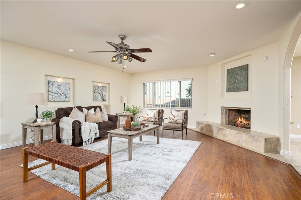 760 West Aster Street Upland, CA 91786 - Photo 4 of 40 a living room with furniture and a fireplace