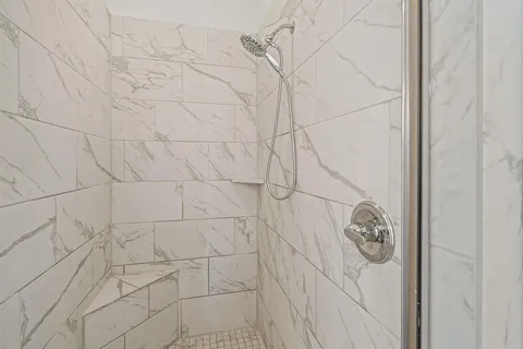 a bathroom with a sink a toilet and bathtub