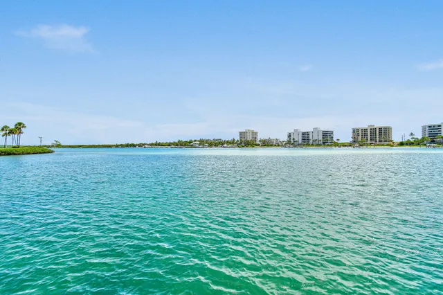 an aerial view of a house with outdoor space lake view and lake view