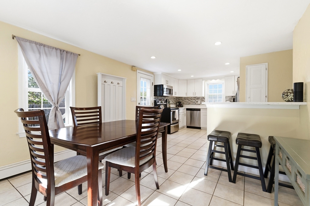 30 Huntington Road Plymouth, MA 02360 - Photo 6 of 35 a dining room with furniture and kitchen view