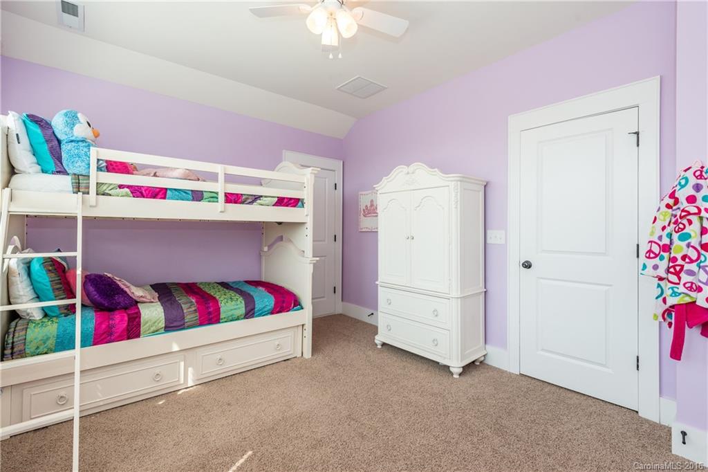 225 Coneflower Place, Unit 1405 Fort Mill, SC 29708 - Photo 16 of 22 a utility room with baby toys