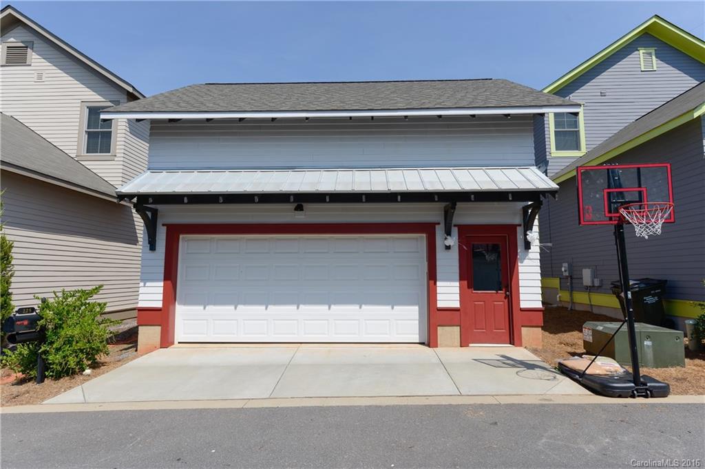 225 Coneflower Place, Unit 1405 Fort Mill, SC 29708 - Photo 3 of 22 a front view of a house with garage