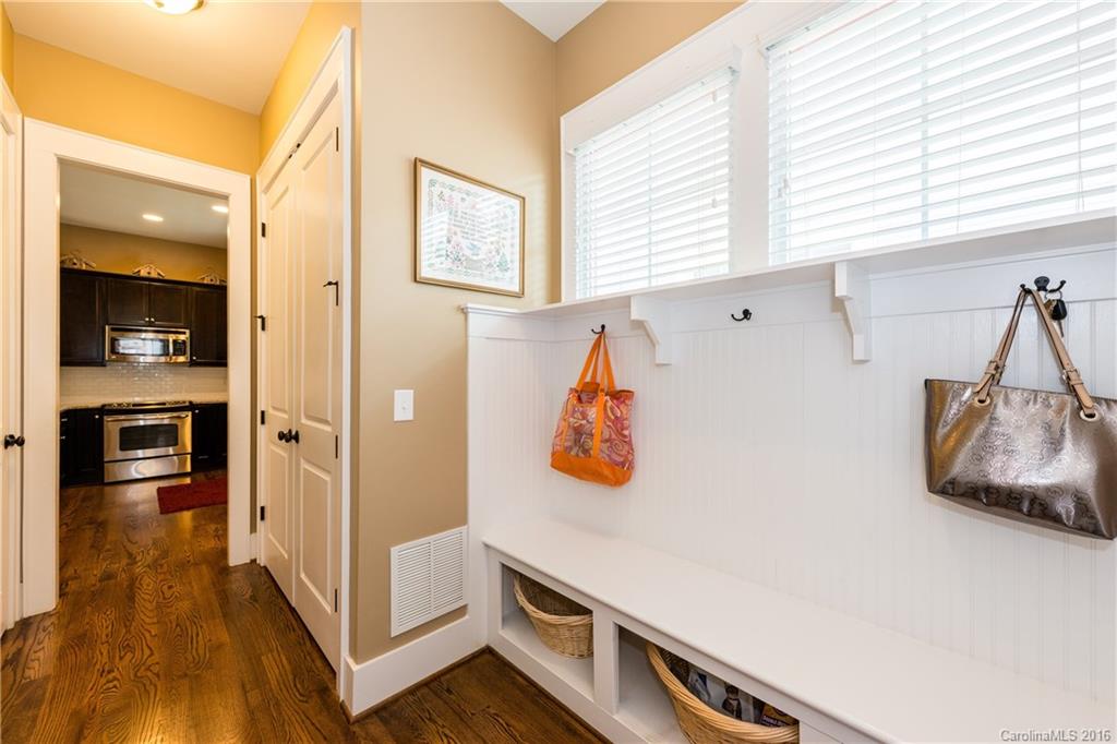 225 Coneflower Place, Unit 1405 Fort Mill, SC 29708 - Photo 21 of 22 a kitchen with stainless steel appliances a refrigerator and a stove