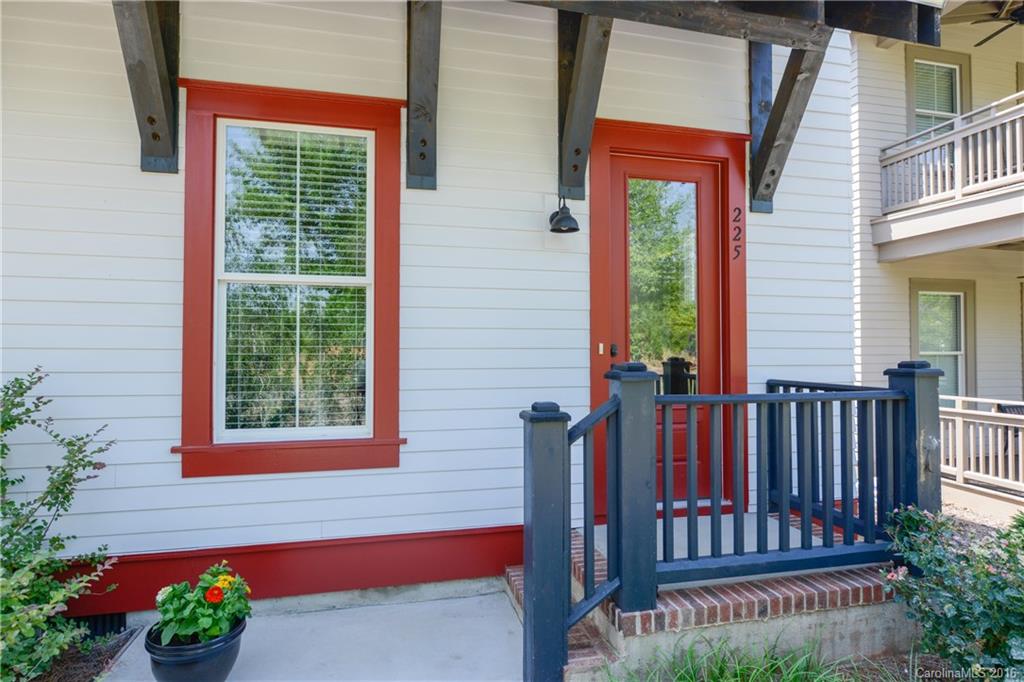 225 Coneflower Place, Unit 1405 Fort Mill, SC 29708 - Photo 4 of 22 a view of a house with a porch