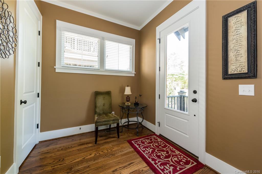 225 Coneflower Place, Unit 1405 Fort Mill, SC 29708 - Photo 5 of 22 a living room with furniture and a window