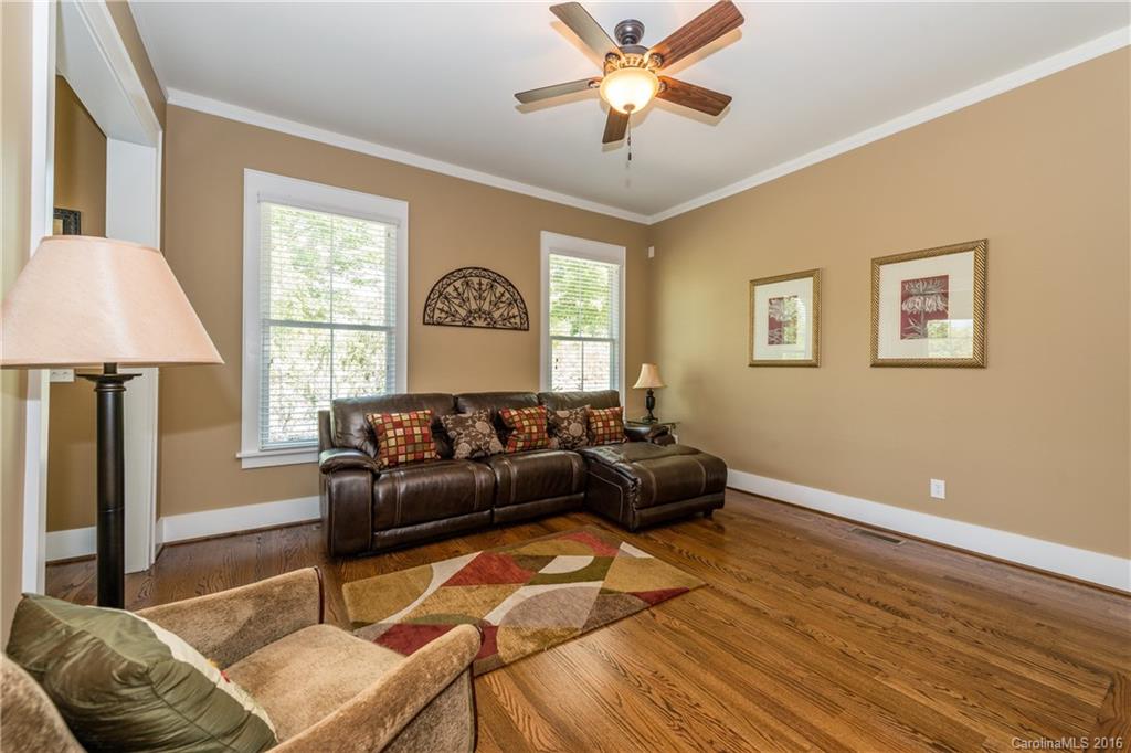 225 Coneflower Place, Unit 1405 Fort Mill, SC 29708 - Photo 7 of 22 a living room with furniture and a window
