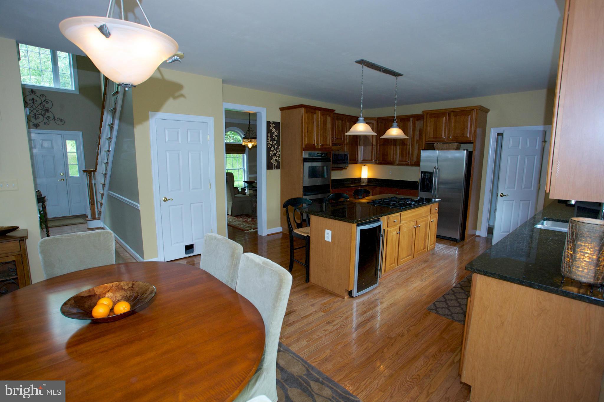 18687 Canby Road Leesburg, VA 20175 - Photo 13 of 30 Gourmet kitchen and adjacent breakfast room