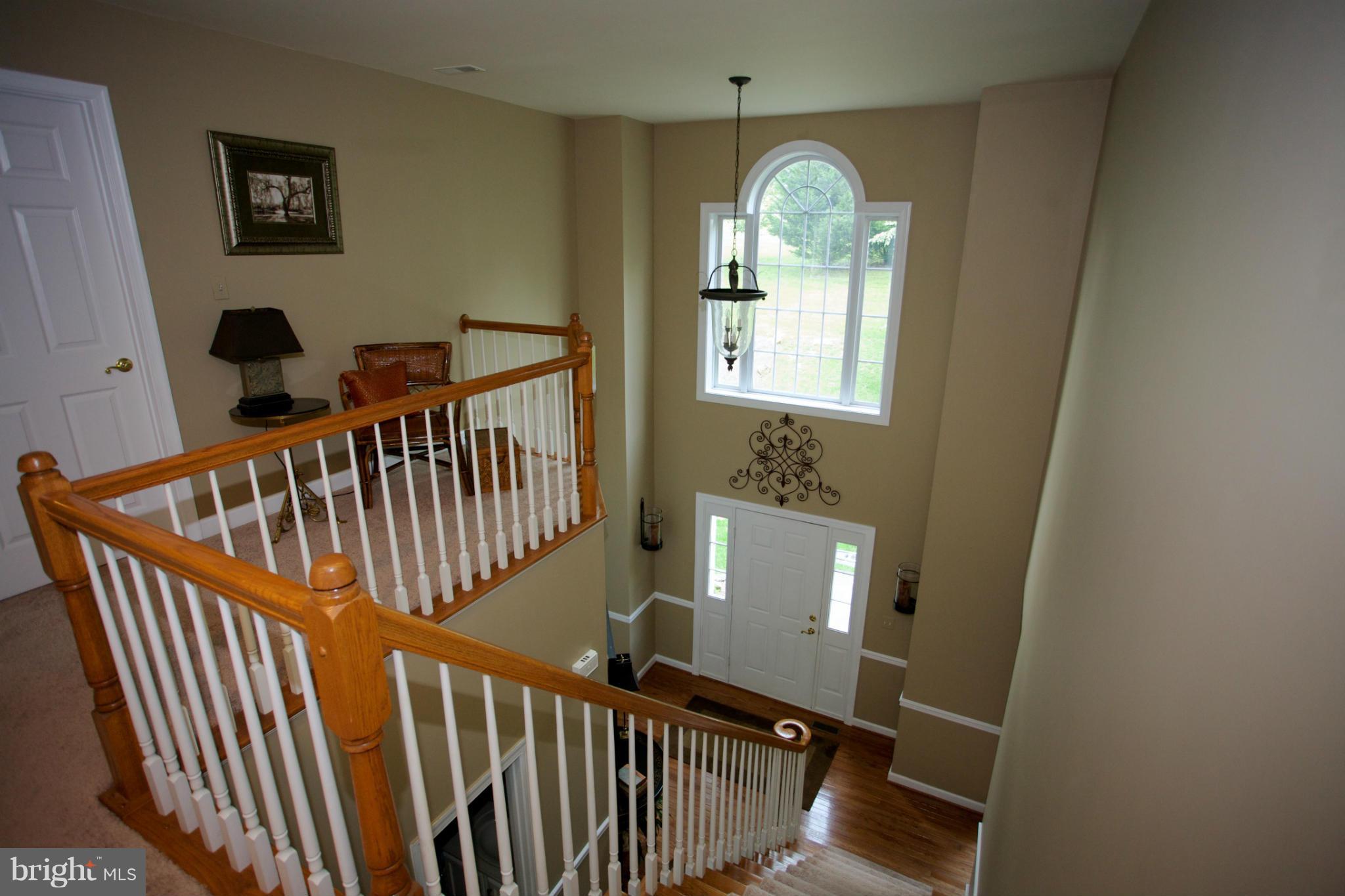 18687 Canby Road Leesburg, VA 20175 - Photo 17 of 30 Two story foyer and upper landing