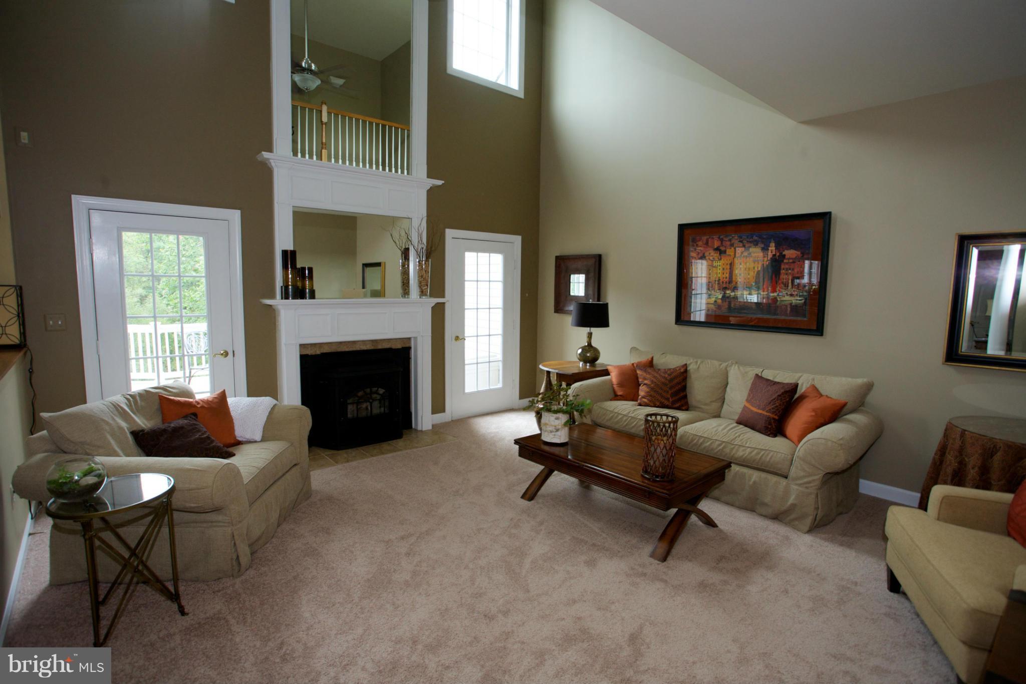 18687 Canby Road Leesburg, VA 20175 - Photo 3 of 30 Two story great room with pellet stove FP