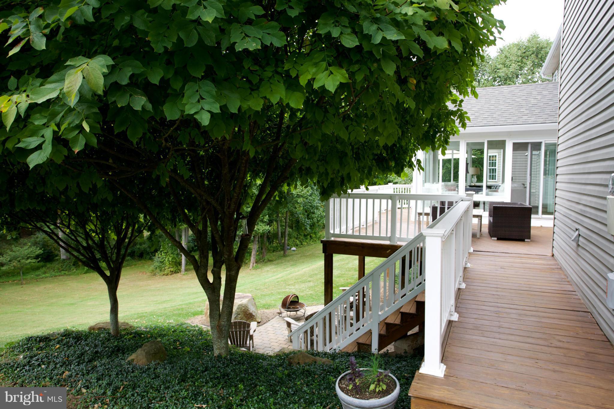 18687 Canby Road Leesburg, VA 20175 - Photo 26 of 30 Extended rear deck surrounds sunroom