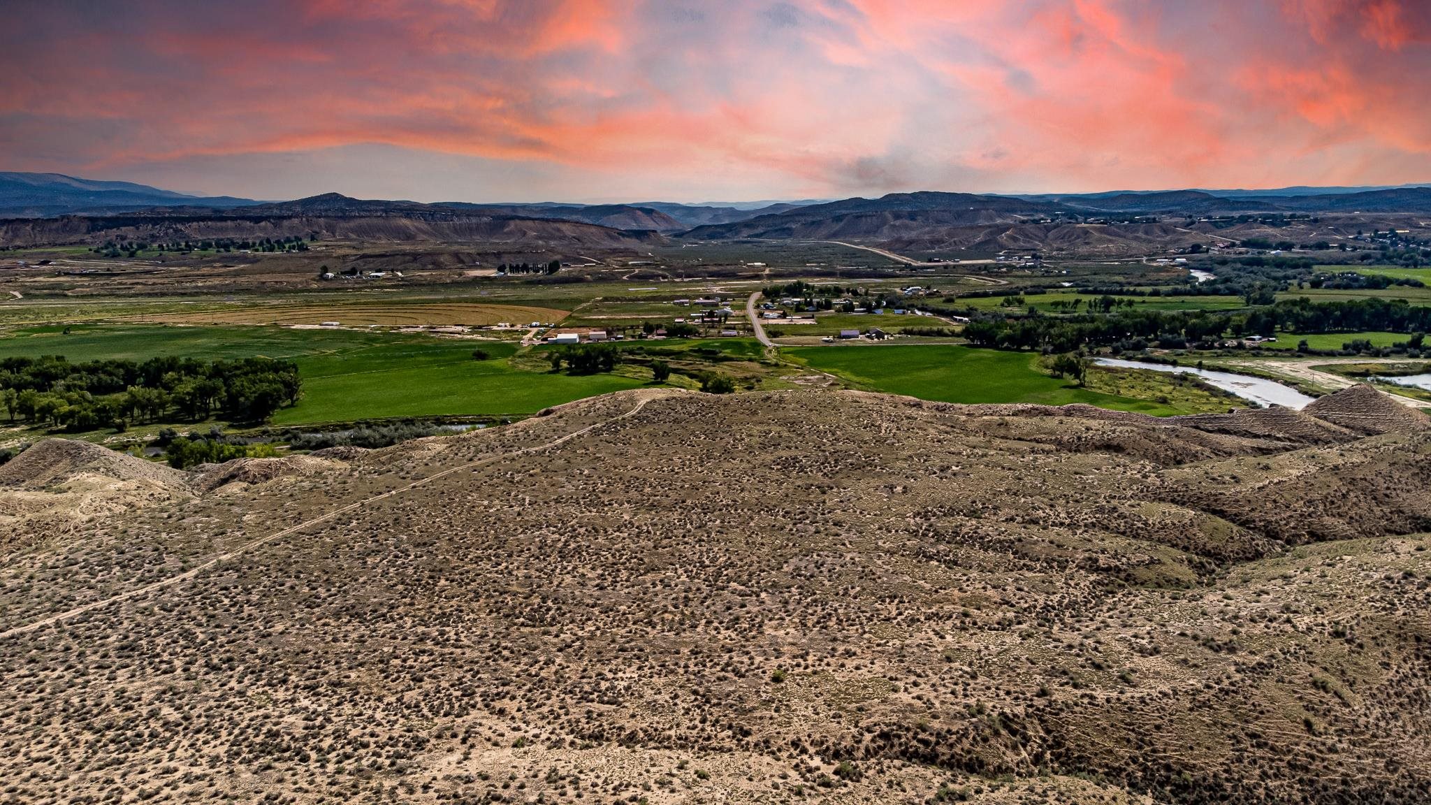 412 Rio Mesa Drive Rangely, CO 81648 - Photo 11 of 14 a view of a city with mountains in the background