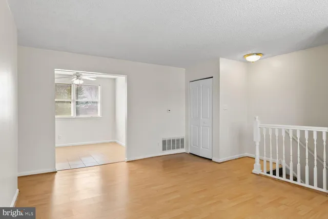 an empty room with windows