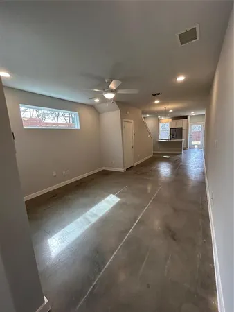 a view of a livingroom with furniture and chandelier