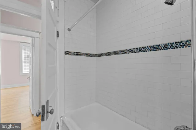 a bathroom with a bathtub