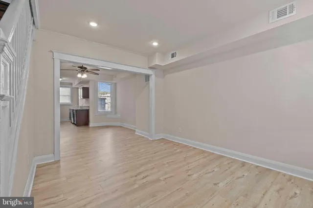 a view of a livingroom with wooden floor