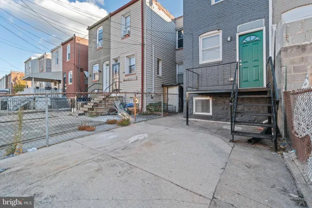 a view of a house with a street