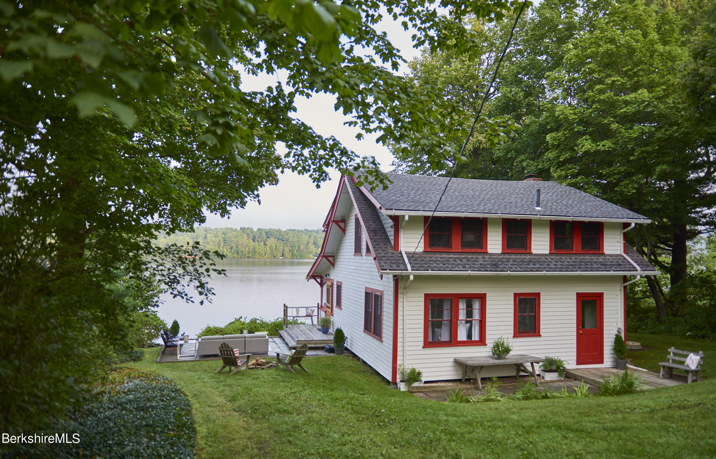 23 Mahkeenac Road Stockbridge, MA 01262 - Photo 3 of 37 a front view of a house with garden