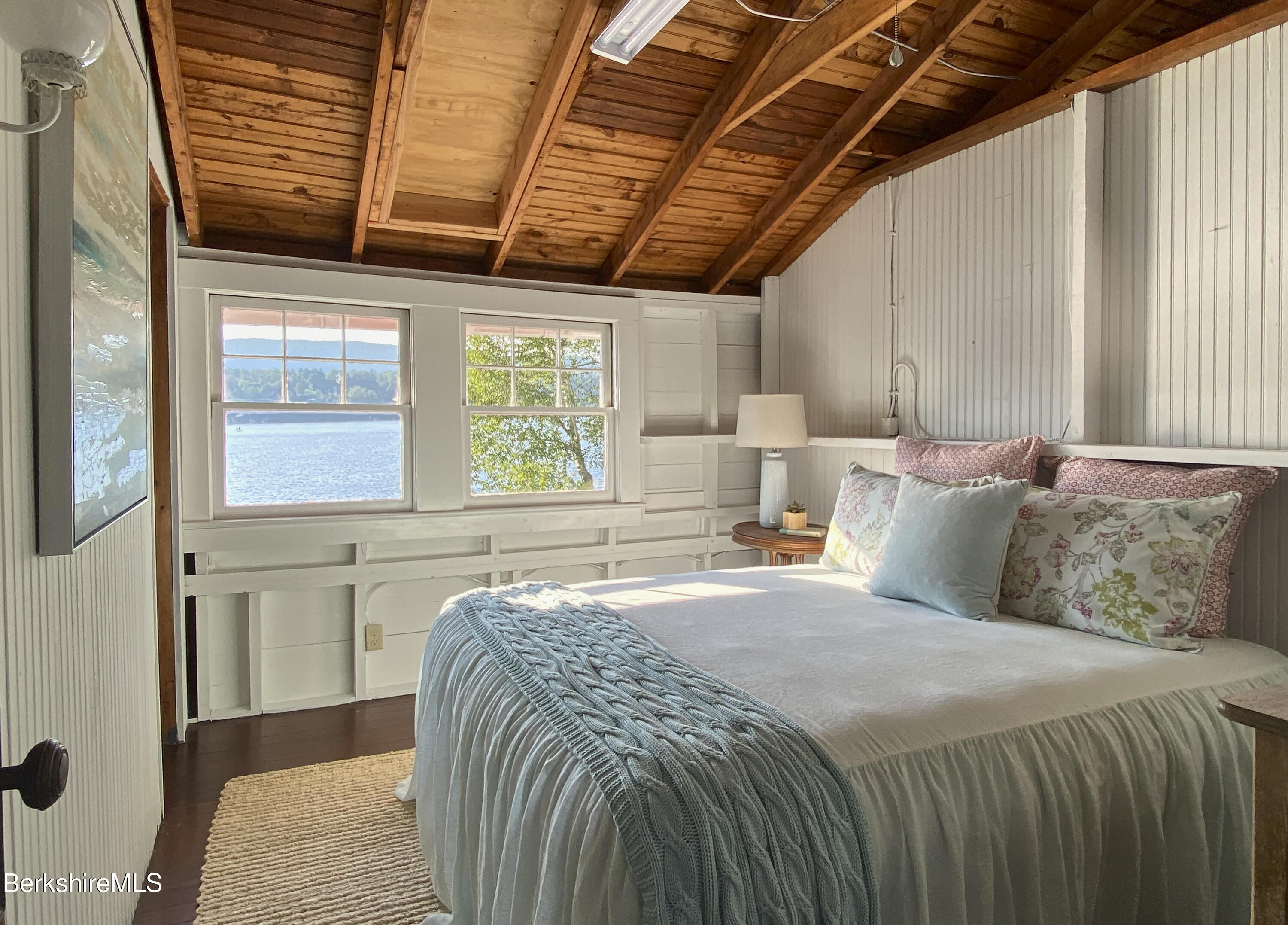 23 Mahkeenac Road Stockbridge, MA 01262 - Photo 22 of 37 a bed sitting in a spacious bedroom next to a window