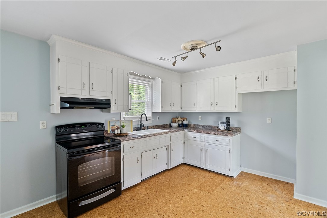 15418 Saddlebrook Road Chesterfield, VA 23838 - Photo 12 of 32 a kitchen with a sink stove and cabinets
